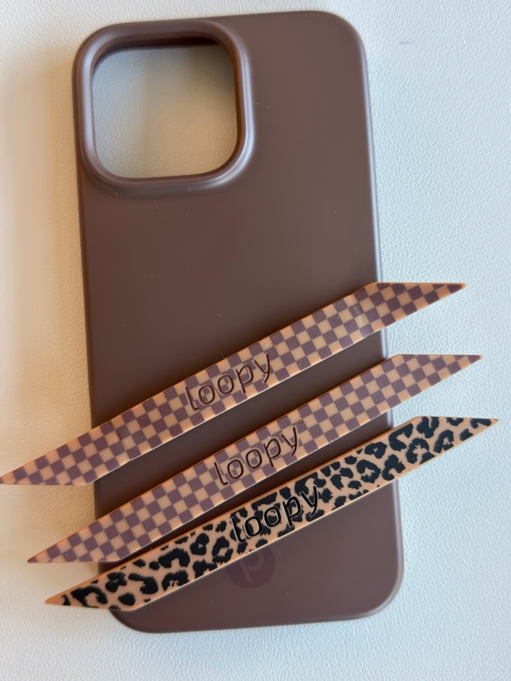 iPhone 16 Pro Max Brown Loopy with fun loops
